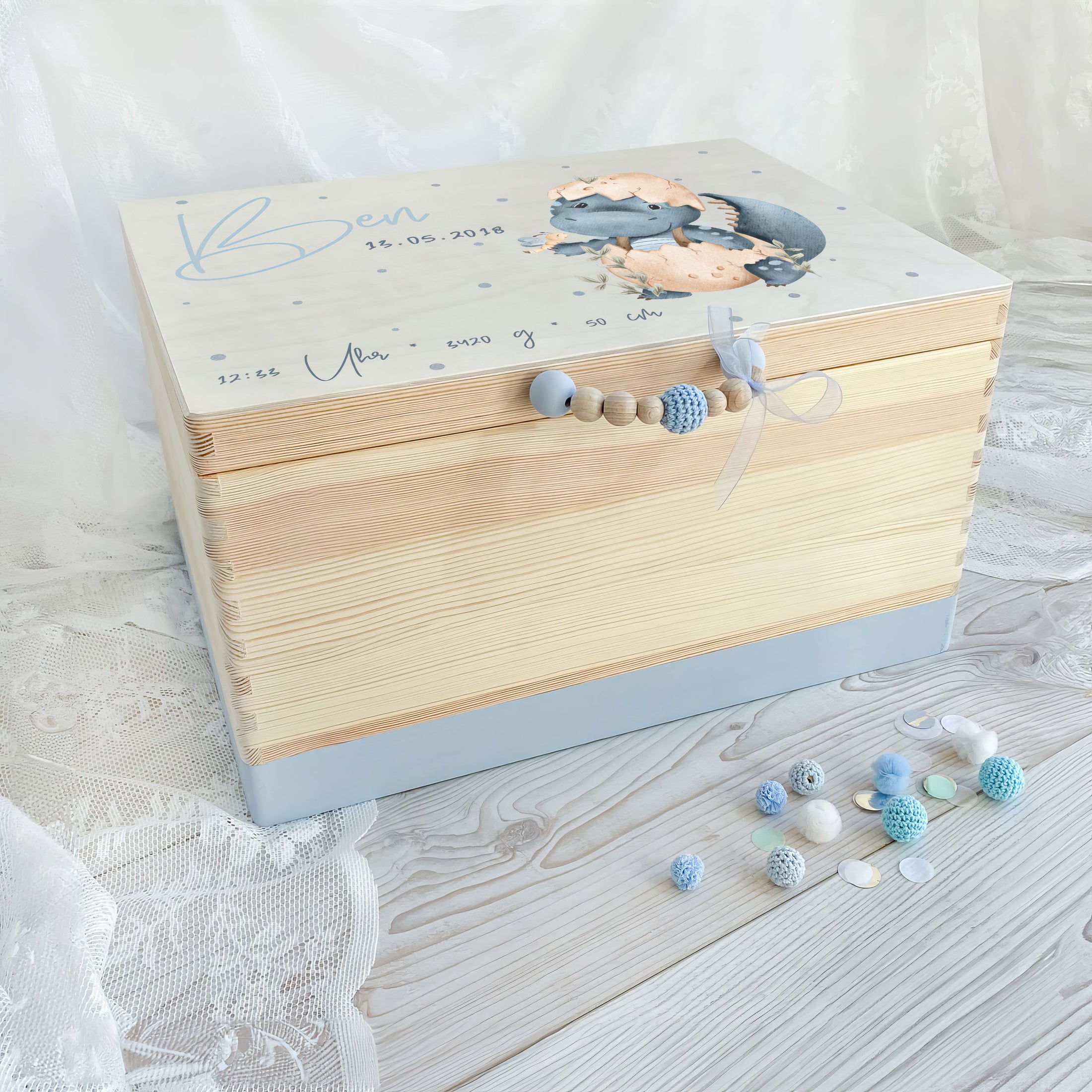 Erinnerungskiste Dino im Ei