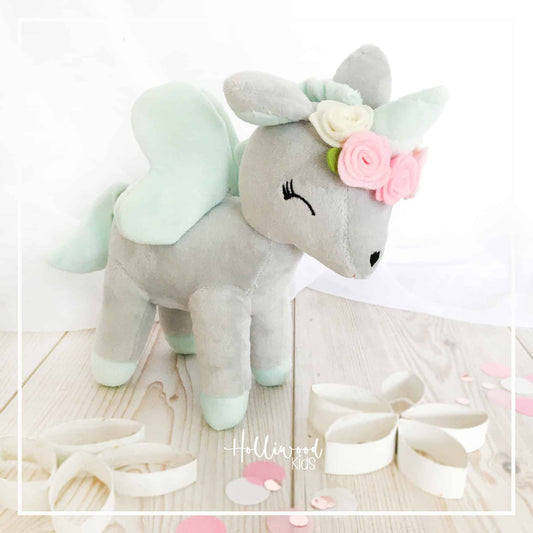 Einhorn mit Blumenkranz