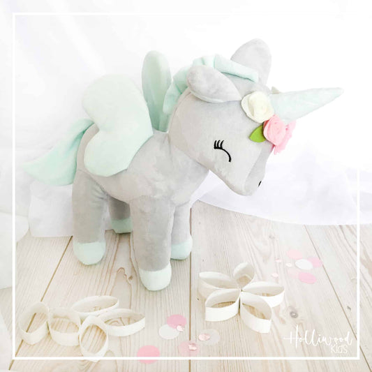 Einhorn mit Blumenkranz