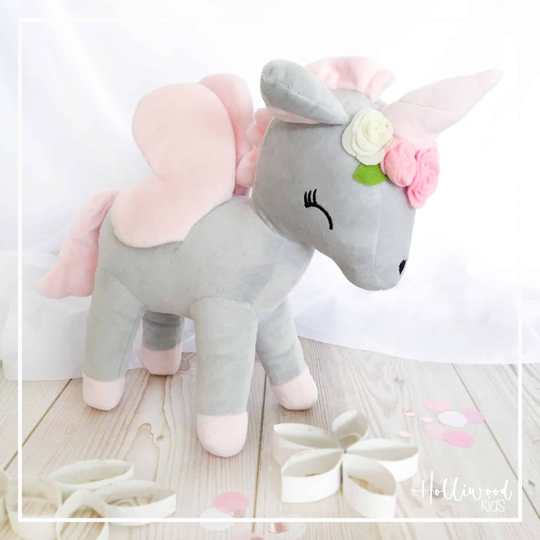 Einhorn mit Blumenkranz